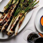 Calçotadas en Madrid: dónde disfrutar del auténtico sabor catalán a la brasa